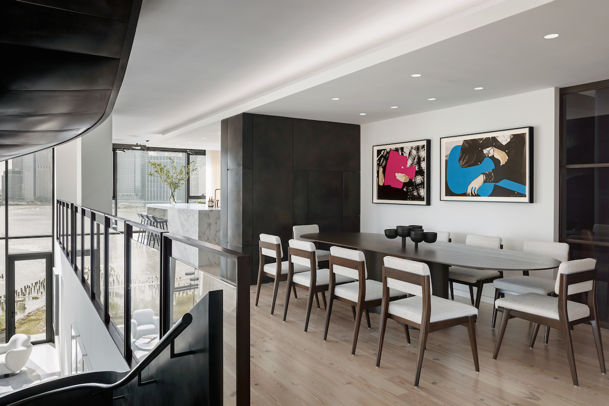 Dining room with harbor views and staircase